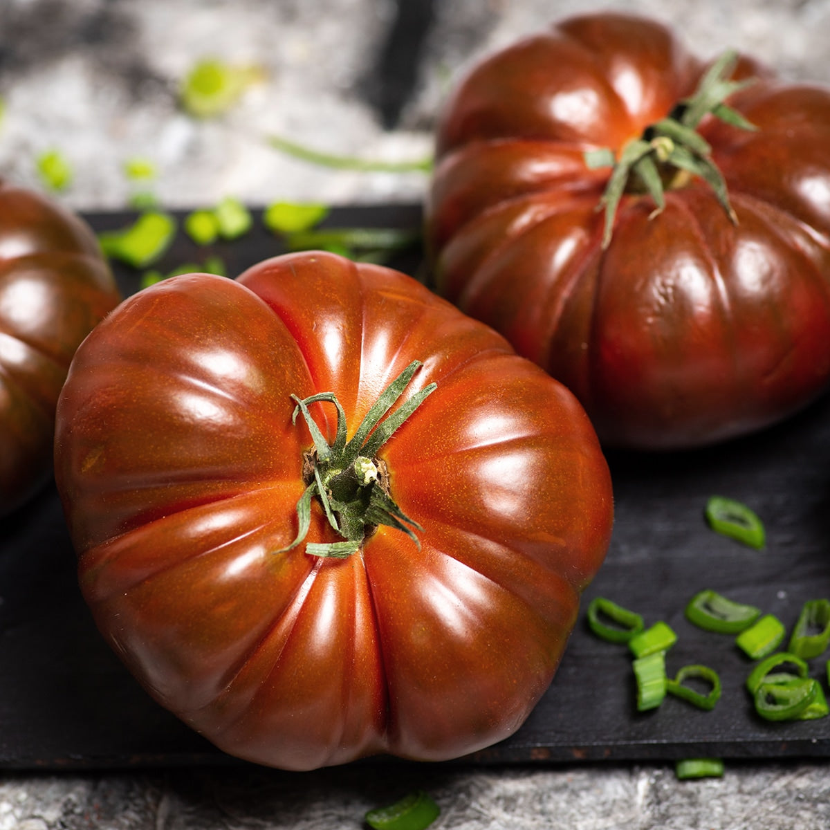 Tomatoes on a back counter 