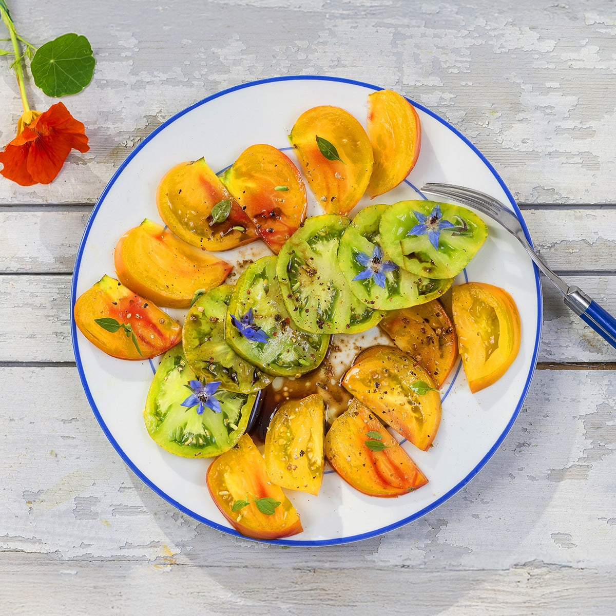 Pineapple tomato slices on a plate