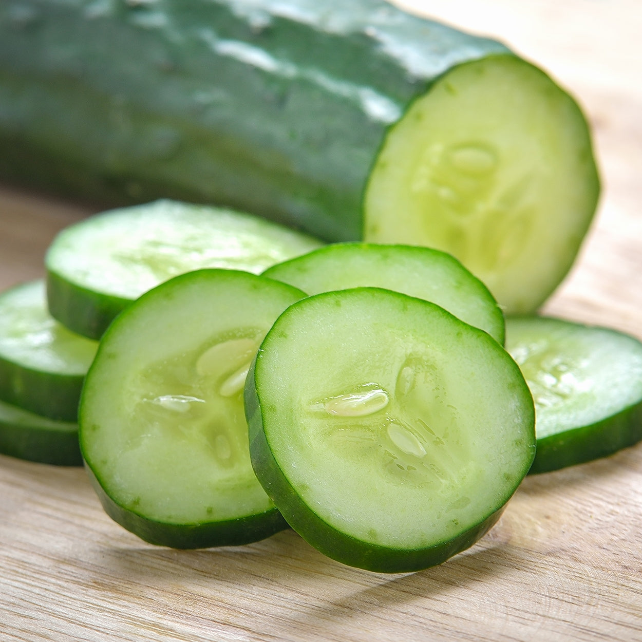 Sliced Cucumbers on a counter 